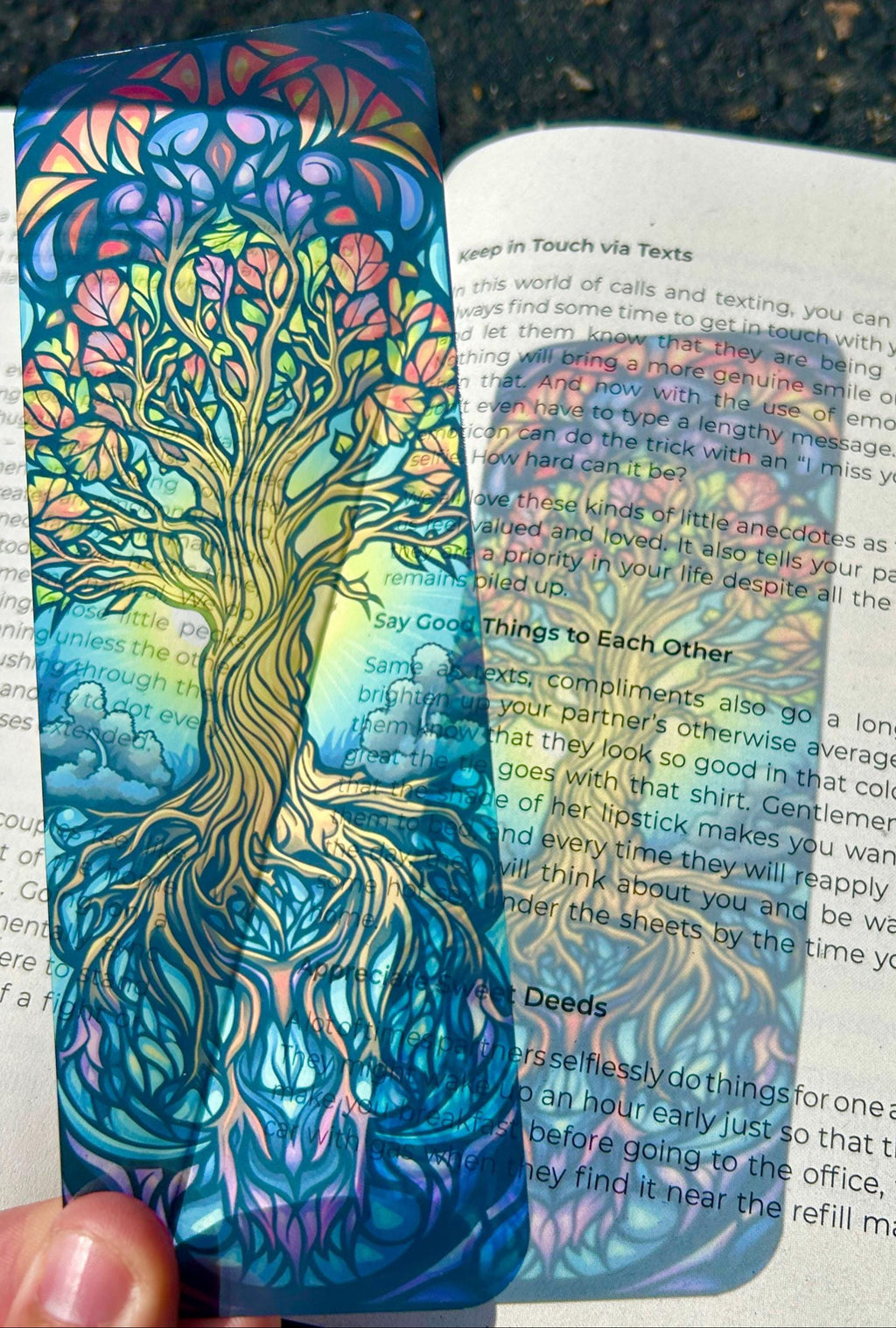 Colorful tree-shaped bookmark on an open book