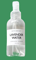 Bottle of lavender water on a white background