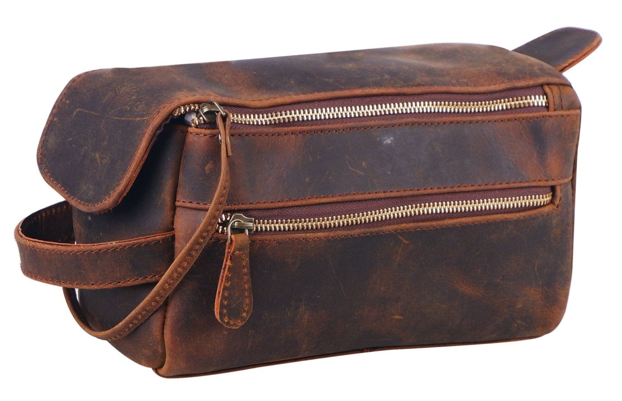 Brown leather toiletry bag with zippers on a white background