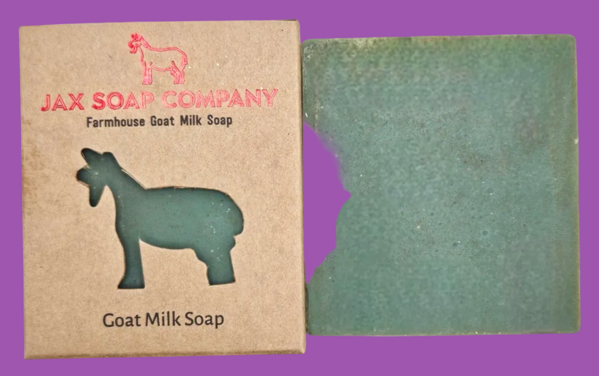 Green goat milk soap next to its packaging with 'Jax Soap Company' branding on a white background.