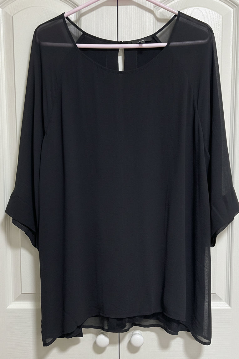 Women's long sleeve blouse in greenish black. Size 2x