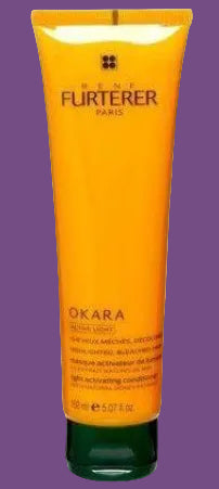 Orange hair care product tube with 'René Furterer' branding on a white background