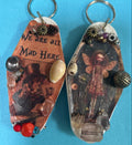 A pair of retro motel key rings.