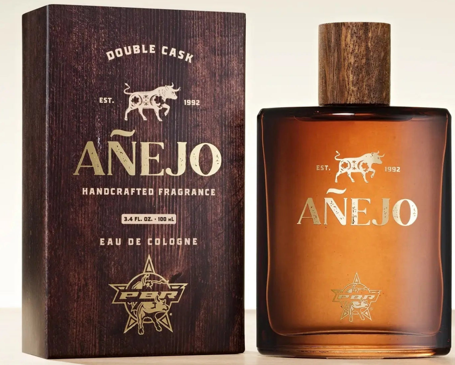 Anejo cologne bottle and packaging on a light background