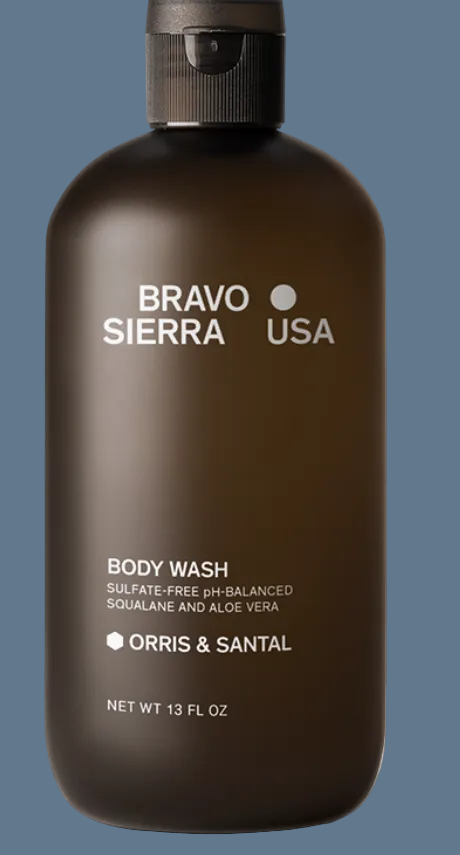 Brown bottle of Bravo Sierra body wash on a gray background