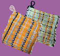 Woven fabric with a pattern on a textured surface