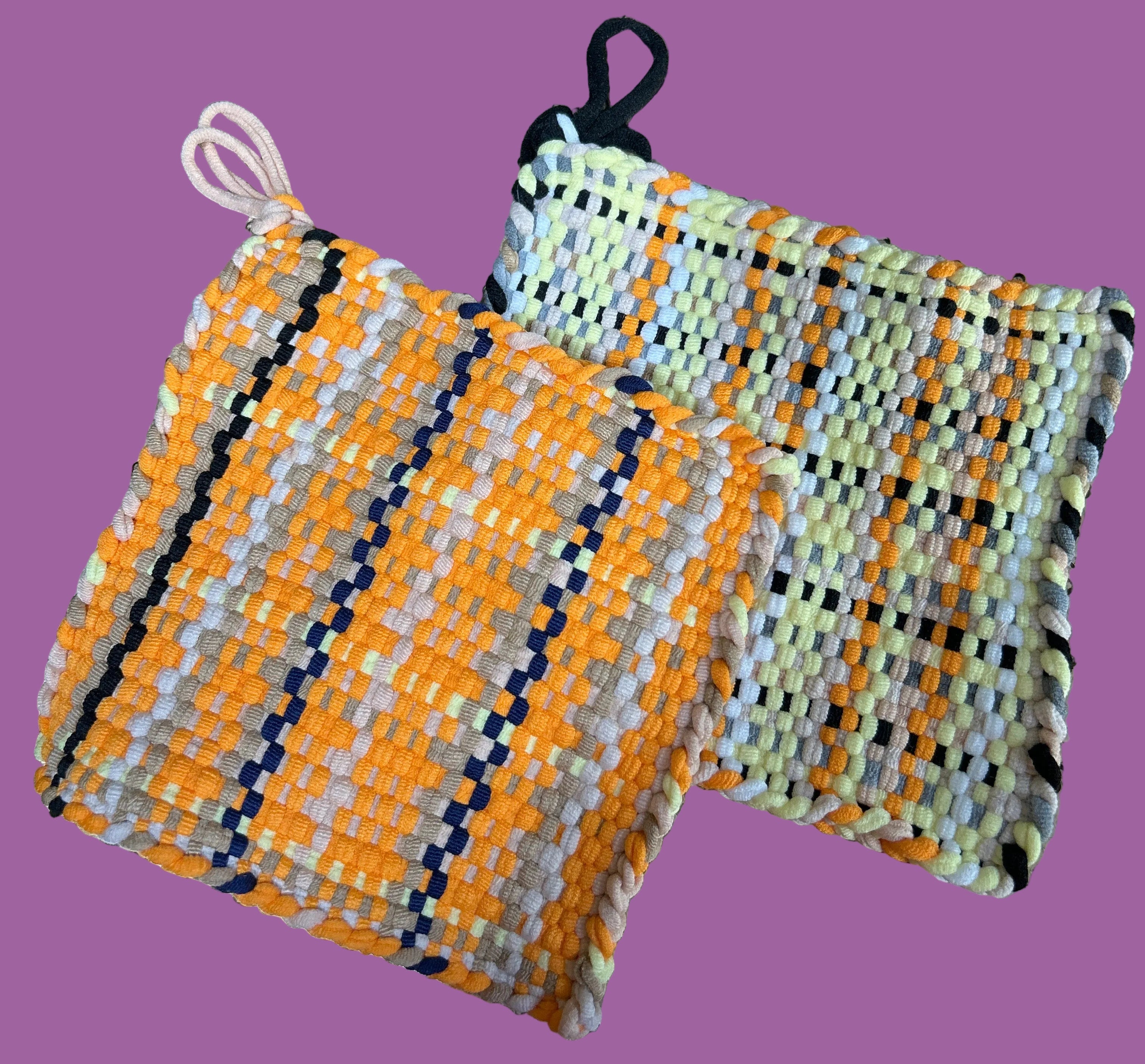 Woven fabric with a pattern on a textured surface