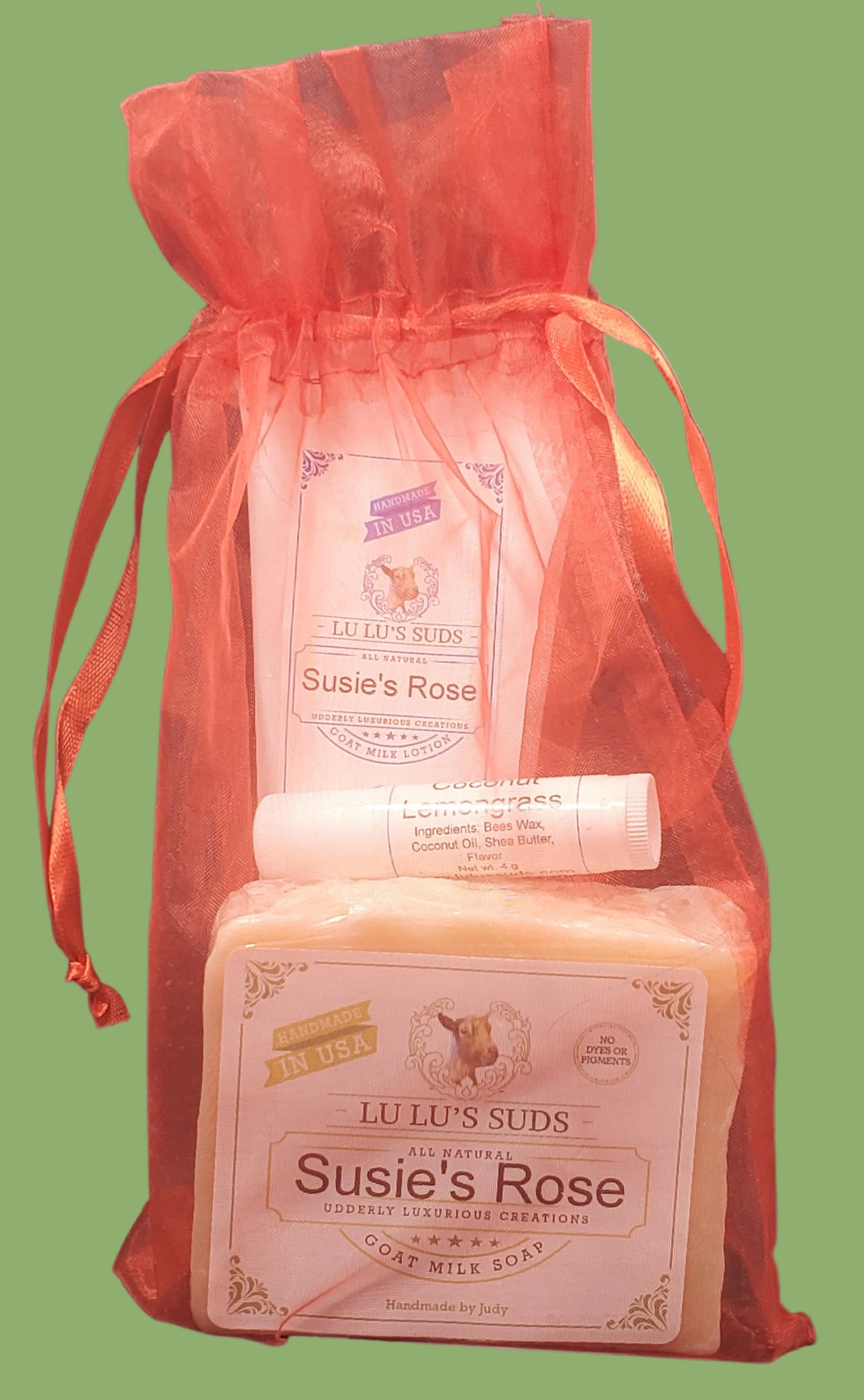 Two products labeled 'Susie's Rose' in a red drawstring bag on a white background