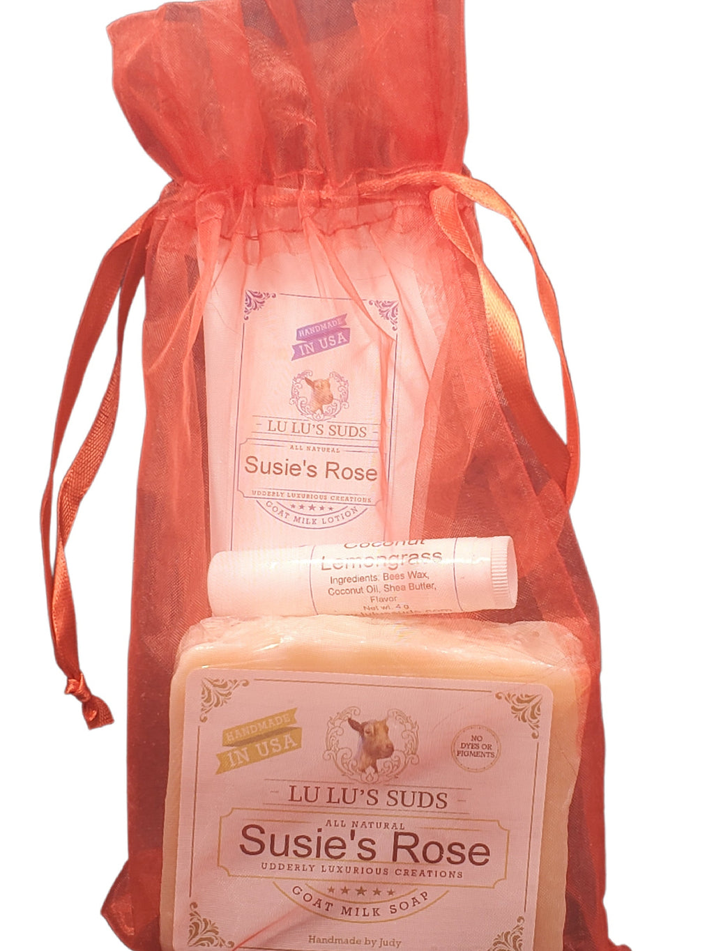 Two products labeled 'Susie's Rose' in a red drawstring bag on a white background