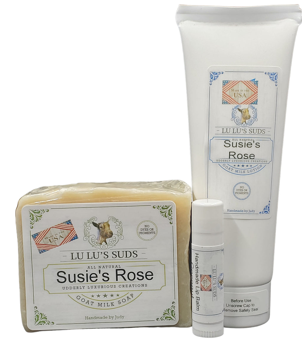 Set of Susie's Rose products including soap, lotion, and cream on a white background