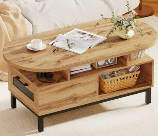 Wooden coffee table with a magazine, cup, and flowers in a living room setting.