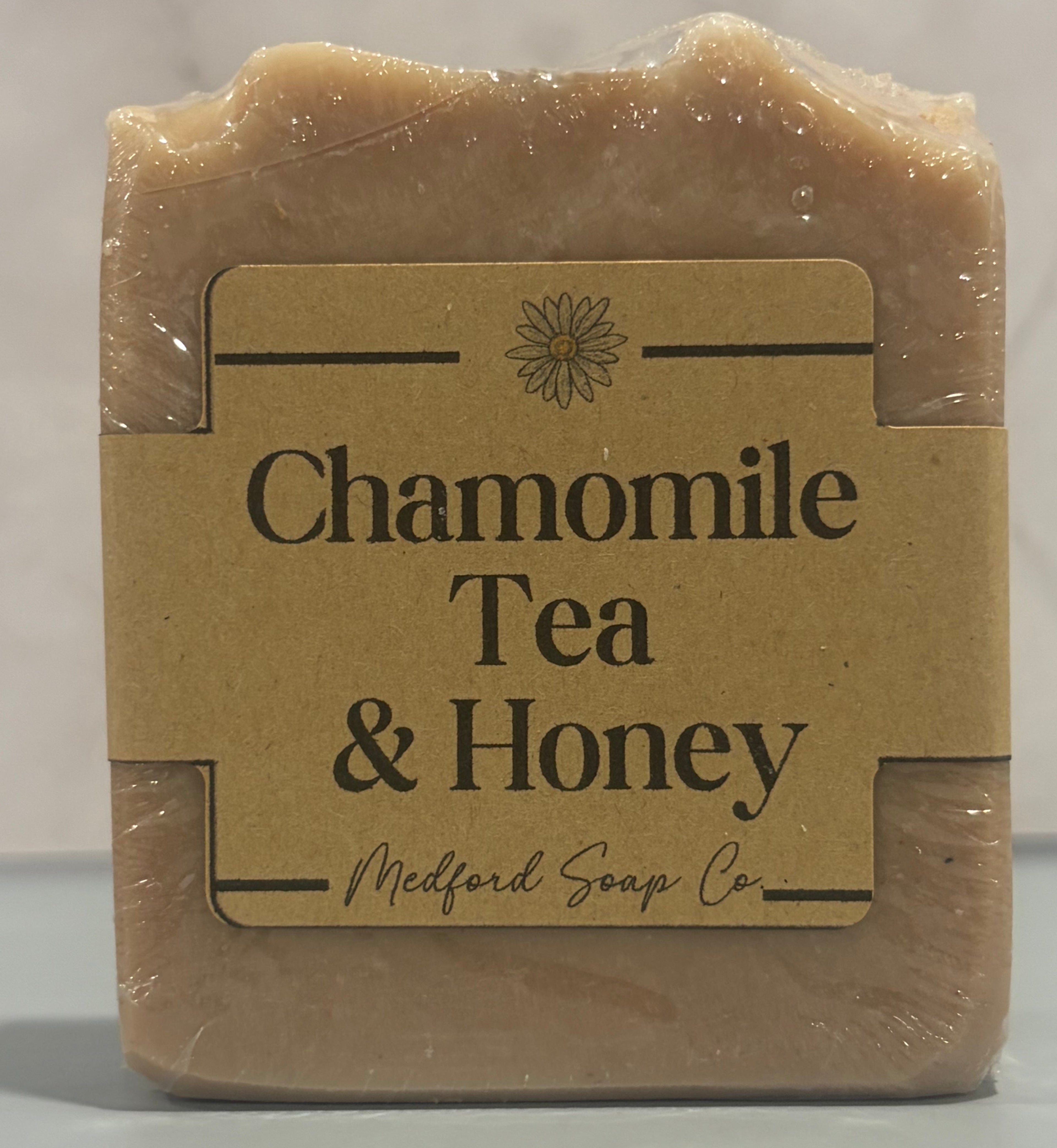 Bar of soap labeled 'Chamomile Tea & Honey' by Medford Soap Co on a neutral background