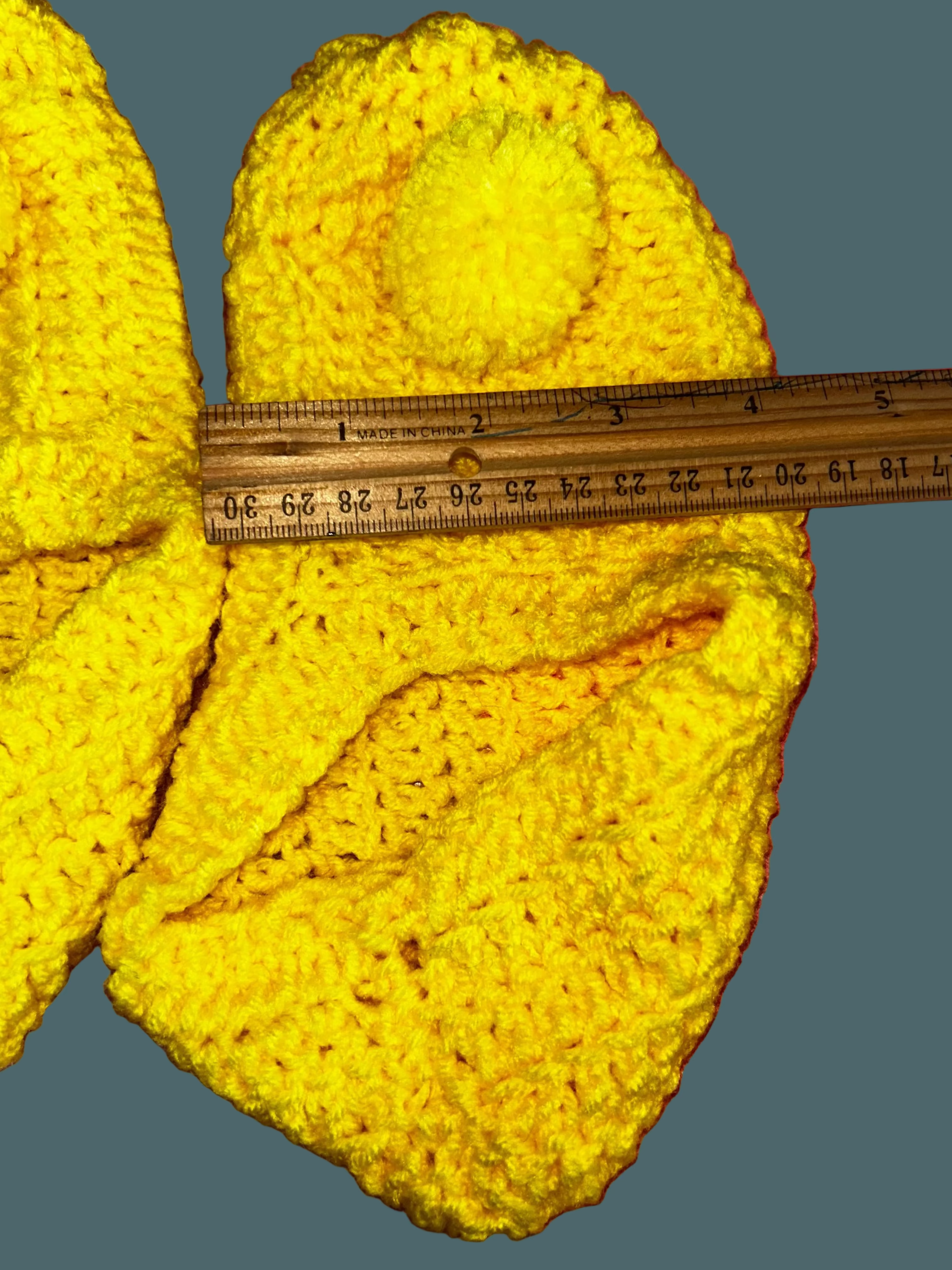 A Pair of Yellow Handmade Crocheted Booties  Medium
