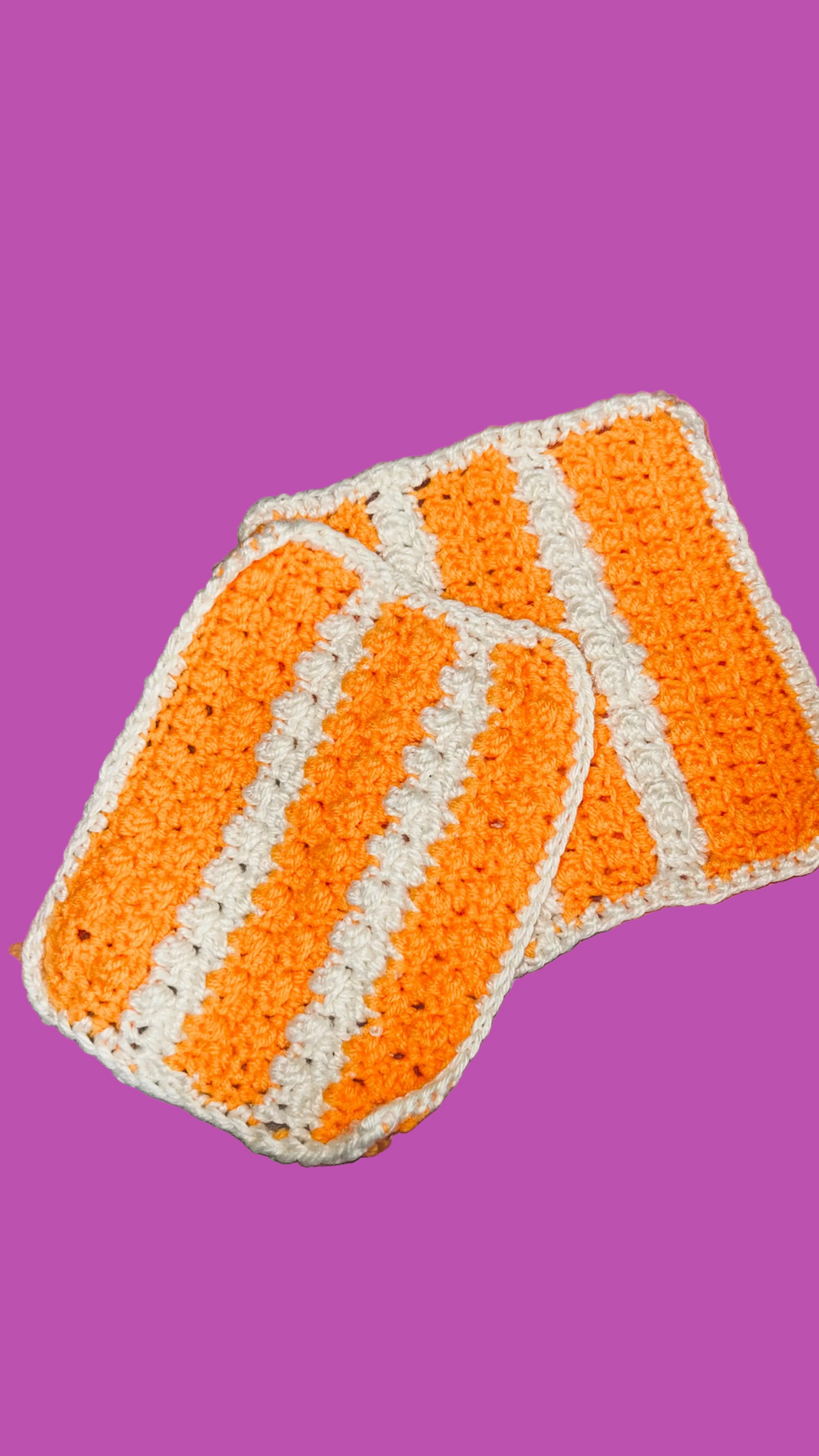 2 Handmade Crocheted Potholders in orange & white stripe.