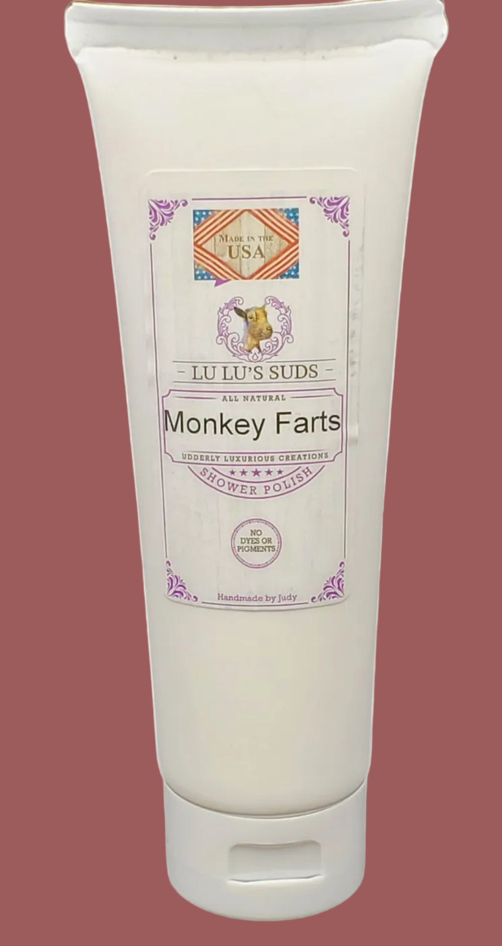 Tube of 'Monkey Farts' shower jelly with a label on a white background