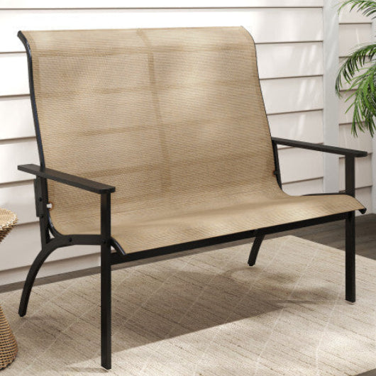 Beige outdoor bench with black frame on a patio