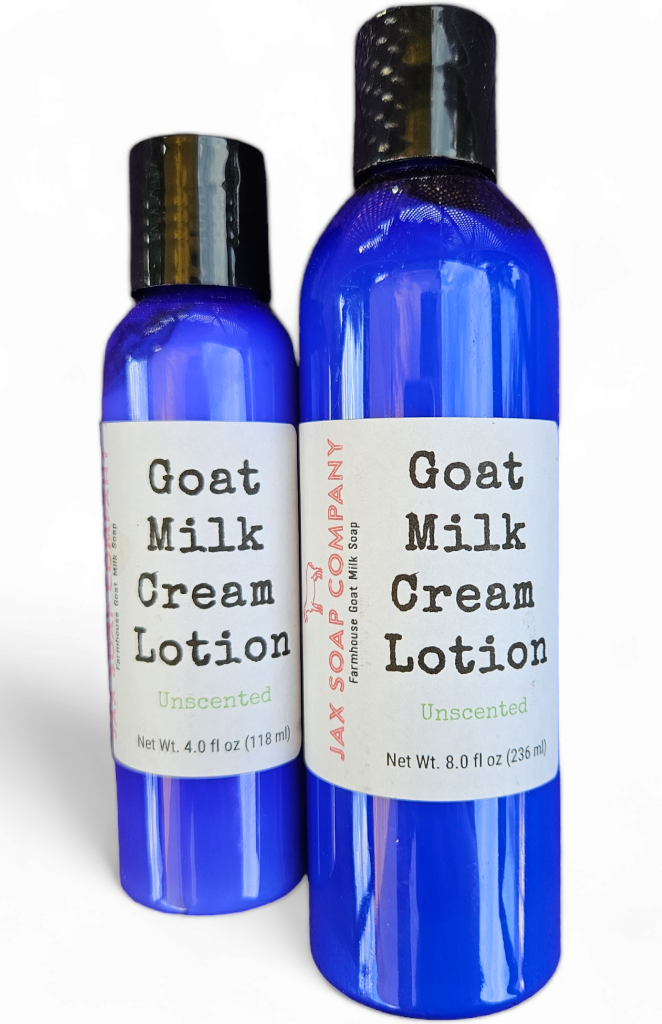 Two bottles of Goat Milk Cream Lotion with labels on a white background