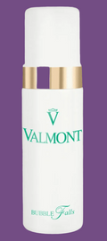 Valmont skincare bottle with gold cap on a white background