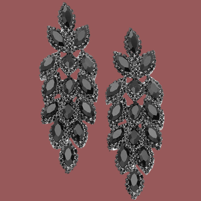 Black chandelier earrings on a white background