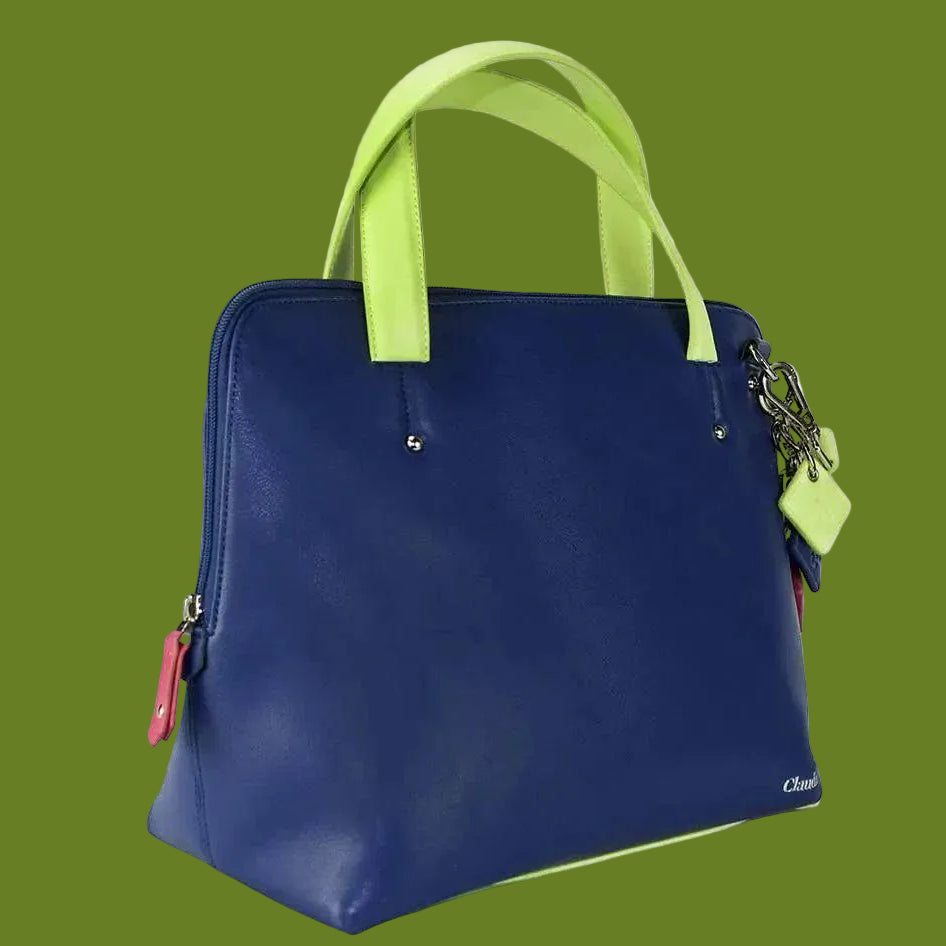 Blue handbag with green handles on a white background