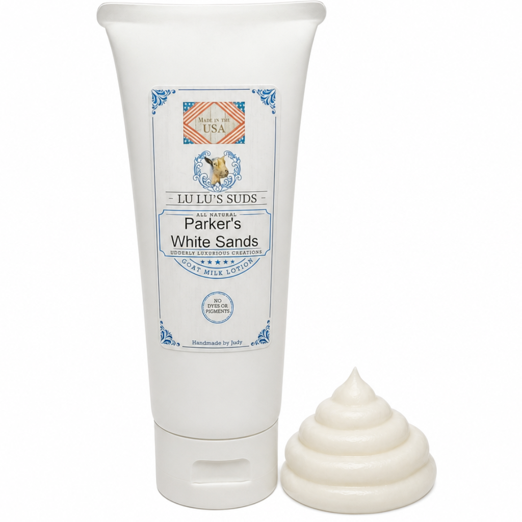 Tube of LuLu's Suds body wash with a sample of the product on a white background