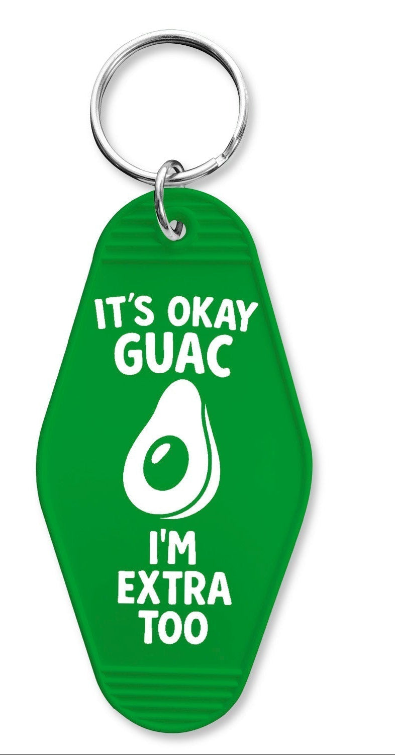Green keychain with avocado graphic and text on a white background