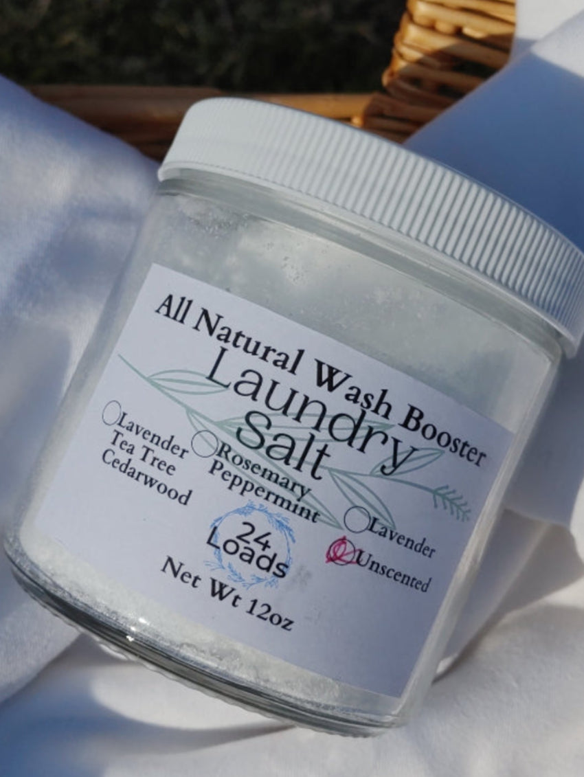 Jar of all natural laundry salt on a white fabric background