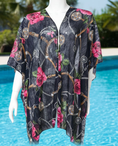 Floral and abstract patterned kimono on a mannequin against a white background
