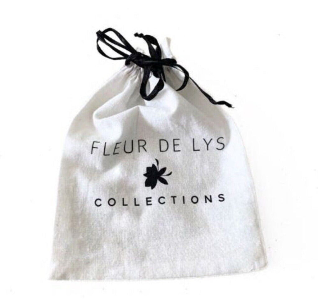 White drawstring bag with 'Fleur de Lys Collections' logo on a white background