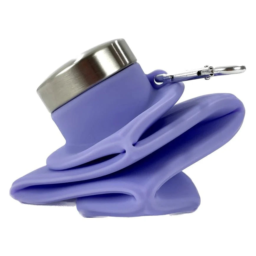 Purple silicone bottle holder with silver cap on a white background