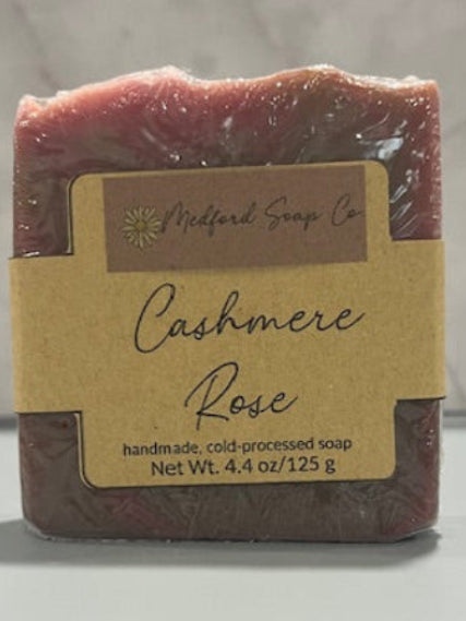 Bar of soap with a 'Cashmere Rose' label on a white background