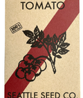 Seed packet for tomato seeds from Seattle Seed Co. with a red and white stripe design.